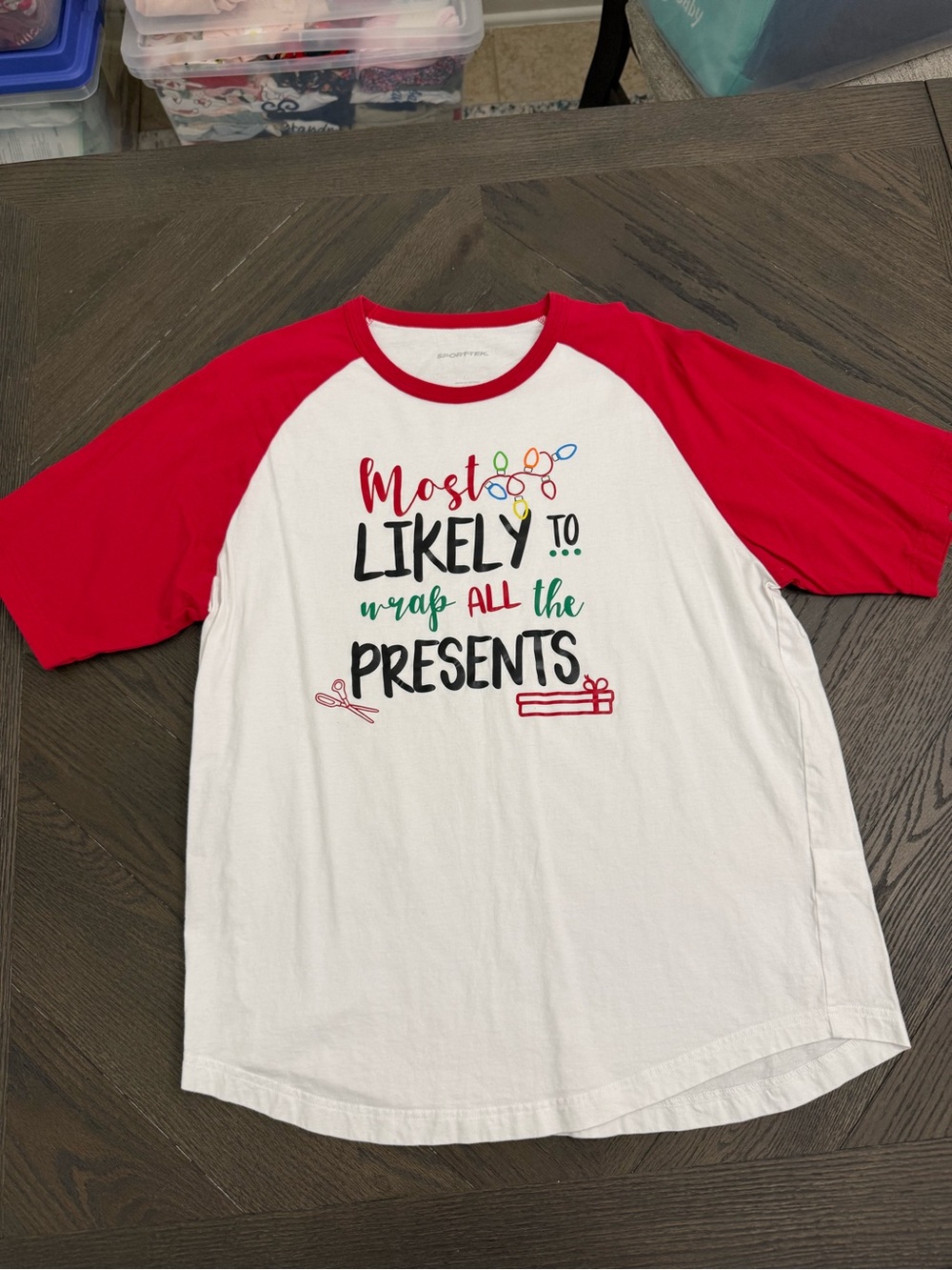Sport-Tek Women's Red/White 'Most Likely to Wrap All the Presents' Tee